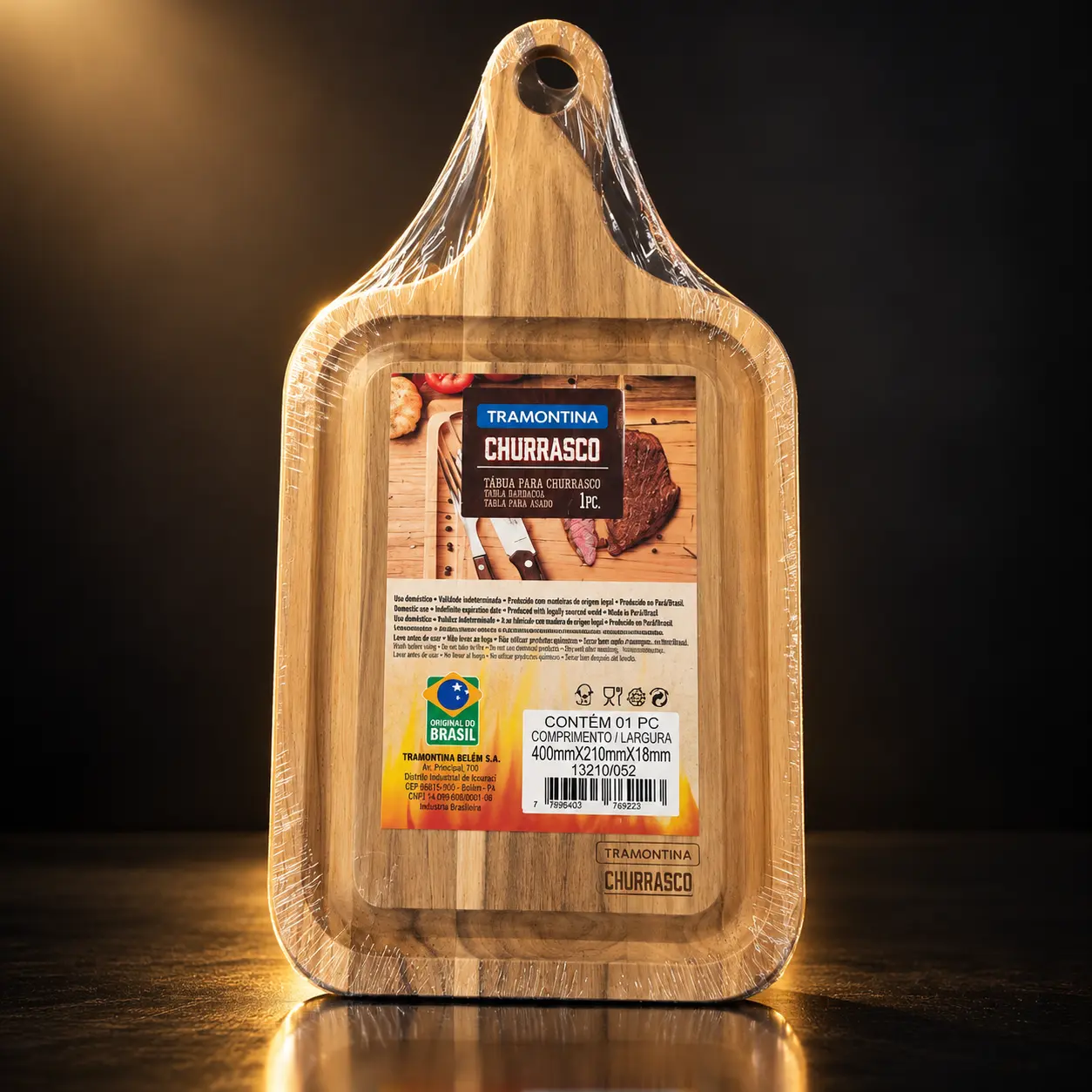 Tábua de madeira teca retangular Tramontina com cabo e tira em couro para cortar e servir churrasco 40 x 21 cm